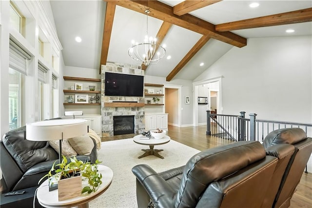 27181 W 100th Ter, Olathe, KS 66061 - living room with a chandelier, beam ceiling, recessed lighting, a stone fireplace, and high vaulted ceiling