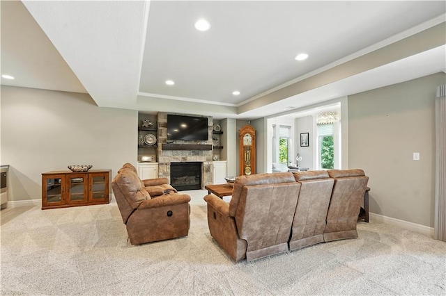 27181 W 100th Ter, Olathe, KS 66061 - living area with carpet flooring, a large fireplace, recessed lighting, ornamental molding, and a tray ceiling