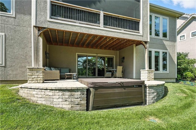 27181 W 100th Ter, Olathe, KS 66061 - patio / terrace featuring a hot tub, a yard, and a patio