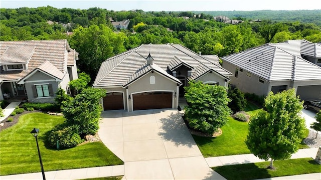 27181 W 100th Ter, Olathe, KS 66061 - view from above of property with a forest