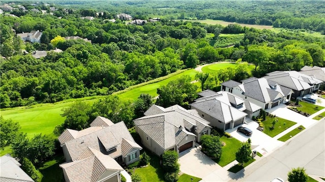 27181 W 100th Ter, Olathe, KS 66061 - aerial perspective of suburban area with a local golf course and a forest
