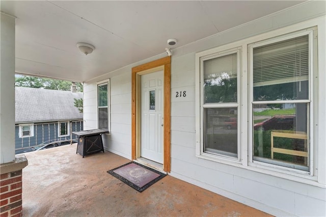 218 N 25th St, Kansas City, KS 66102 - view of exterior entry with a porch