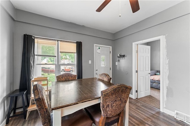 218 N 25th St, Kansas City, KS 66102 - dining space featuring wood finished floors and a ceiling fan