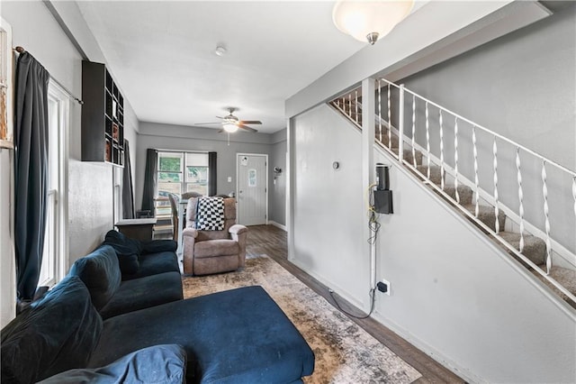 218 N 25th St, Kansas City, KS 66102 - living area featuring stairs, wood finished floors, and ceiling fan