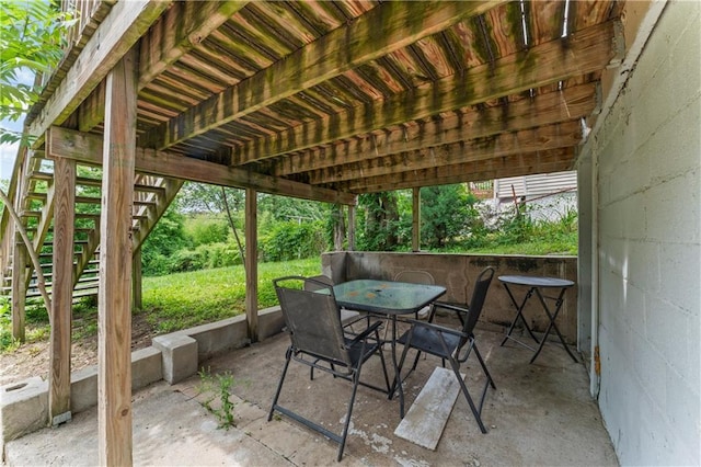 218 N 25th St, Kansas City, KS 66102 - view of patio / terrace with stairs and outdoor dining area
