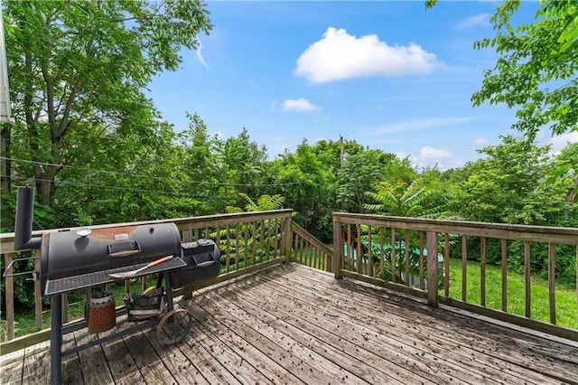 218 N 25th St, Kansas City, KS 66102 - wooden deck featuring grilling area