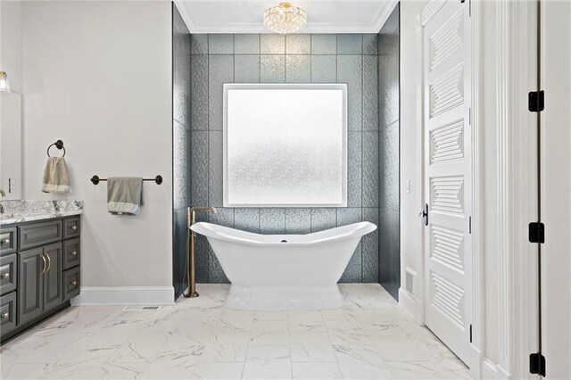 18405 371st Hwy, Platte City, MO 64079 - bathroom with vanity, a freestanding tub, marble finish flooring, and ornamental molding