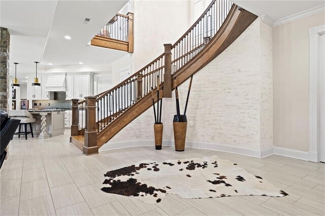 18405 371st Hwy, Platte City, MO 64079 - staircase featuring ornamental molding and recessed lighting