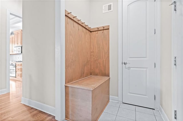 4204 SW Duck Pond Dr, Lees Summit, MO 64082 - mudroom featuring baseboards and light tile patterned floors