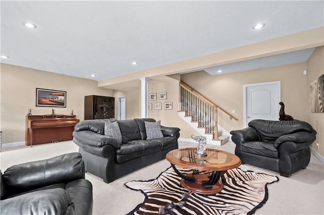 4204 SW Duck Pond Dr, Lees Summit, MO 64082 - carpeted living area featuring decorative columns, stairway, and recessed lighting