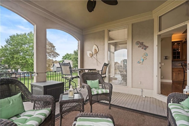 4204 SW Duck Pond Dr, Lees Summit, MO 64082 - wooden deck with ceiling fan and an outdoor hangout area
