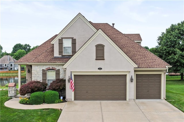 4204 SW Duck Pond Dr, Lees Summit, MO 64082 - french provincial home with stucco siding, concrete driveway, and roof with shingles