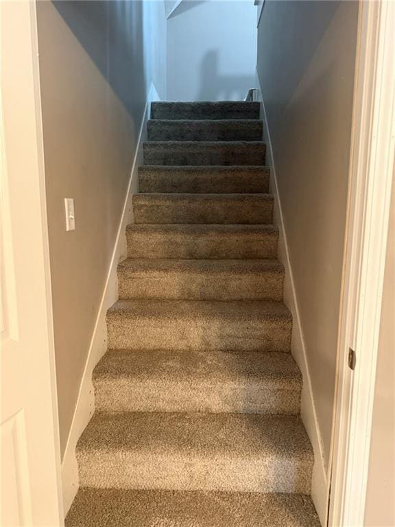 915 Des Moines St, Burlington, KS 66839 - stairs with carpet flooring
