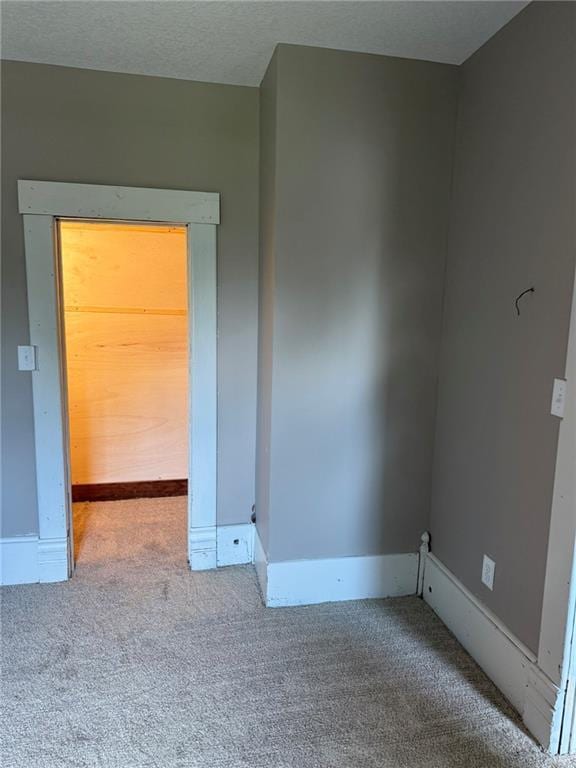 915 Des Moines St, Burlington, KS 66839 - carpeted spare room featuring baseboards