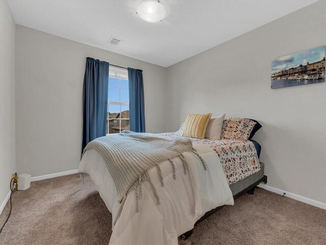21818 W 123rd Ter, Olathe, KS 66061 - carpeted bedroom featuring baseboards