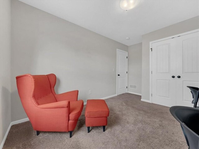 21818 W 123rd Ter, Olathe, KS 66061 - living area featuring carpet flooring and baseboards