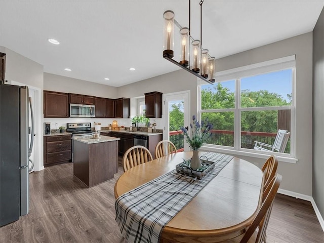 21818 W 123rd Ter, Olathe, KS 66061 - dining room with dark wood-style flooring and recessed lighting
