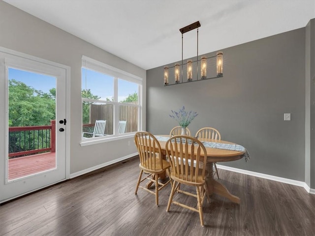 21818 W 123rd Ter, Olathe, KS 66061 - dining area with wood finished floors and a chandelier