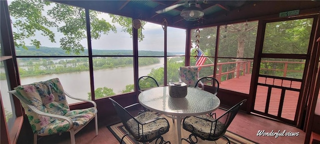 28767 Parkway Dr, Warsaw, MO 65355 - sunroom featuring a water view, a ceiling fan, outdoor dining space, and plenty of natural light
