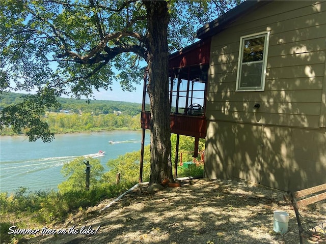 28767 Parkway Dr, Warsaw, MO 65355 - view of side of home with a water view