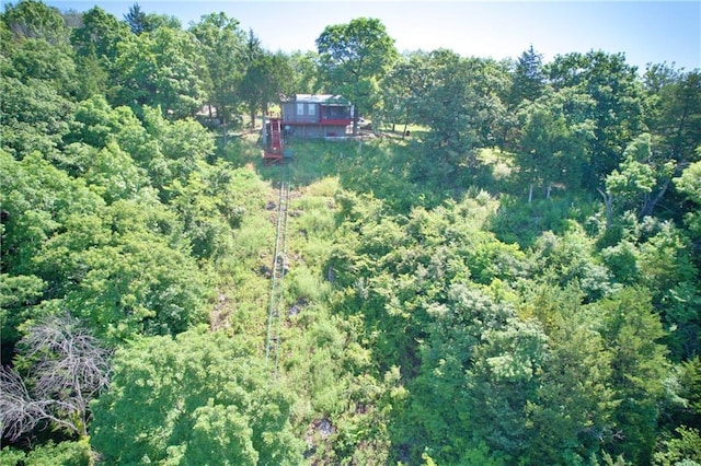 28767 Parkway Dr, Warsaw, MO 65355 - aerial view of property and surrounding area featuring a heavily wooded area