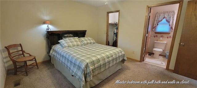 28767 Parkway Dr, Warsaw, MO 65355 - bedroom featuring light carpet, a spacious closet, connected bathroom, and a closet