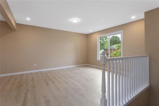 113 SW 21st St, Oak Grove, MO 64075 - empty room with light wood-style floors and recessed lighting