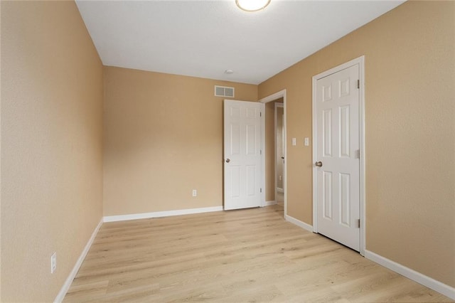 113 SW 21st St, Oak Grove, MO 64075 - unfurnished bedroom featuring light wood-style floors and baseboards