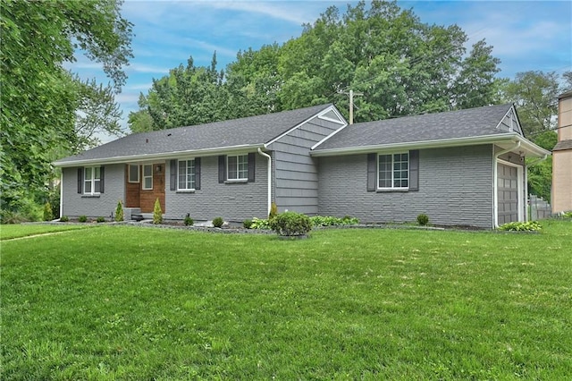 7824 Terrace St, Kansas City, MO 64114 - ranch-style house featuring brick siding, a front lawn, and a garage