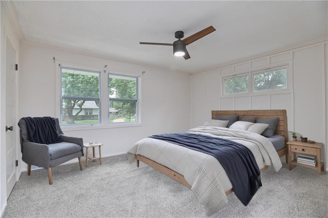 7824 Terrace St, Kansas City, MO 64114 - carpeted bedroom with multiple windows, ornamental molding, and ceiling fan