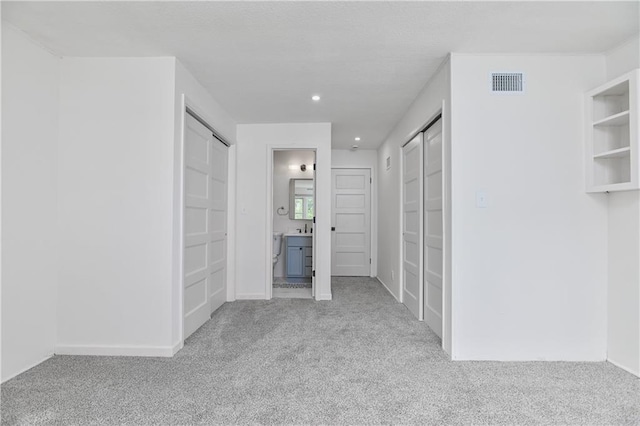 7824 Terrace St, Kansas City, MO 64114 - corridor with carpet and recessed lighting