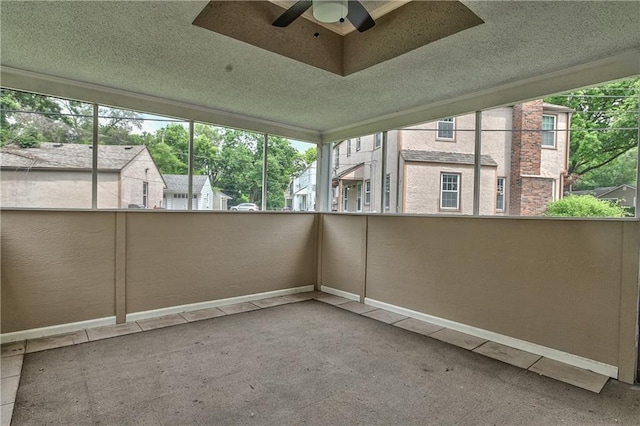7824 Terrace St, Kansas City, MO 64114 - unfurnished sunroom featuring a ceiling fan