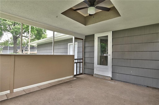 7824 Terrace St, Kansas City, MO 64114 - unfurnished sunroom featuring ceiling fan
