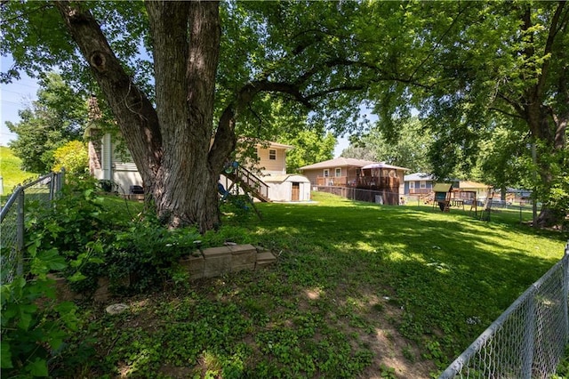 2905 Ajax Rd, Saint Joseph, MO 64503 - fenced backyard with a storage shed