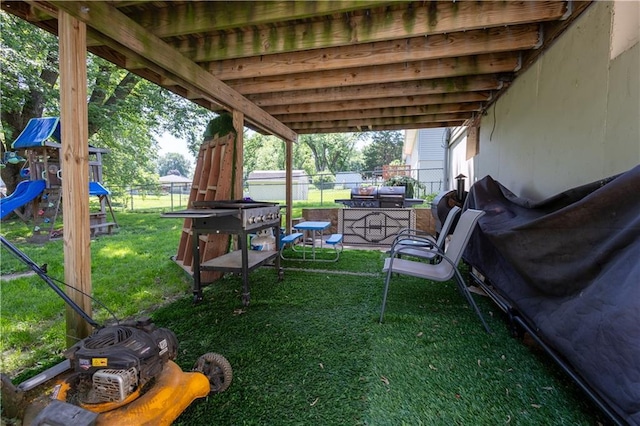 2905 Ajax Rd, Saint Joseph, MO 64503 - fenced backyard with a playground