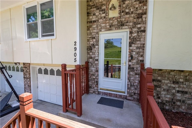 2905 Ajax Rd, Saint Joseph, MO 64503 - doorway to property with an attached garage