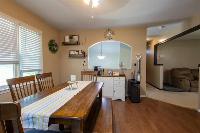 2905 Ajax Rd, Saint Joseph, MO 64503 - dining area featuring wood finished floors and arched walkways
