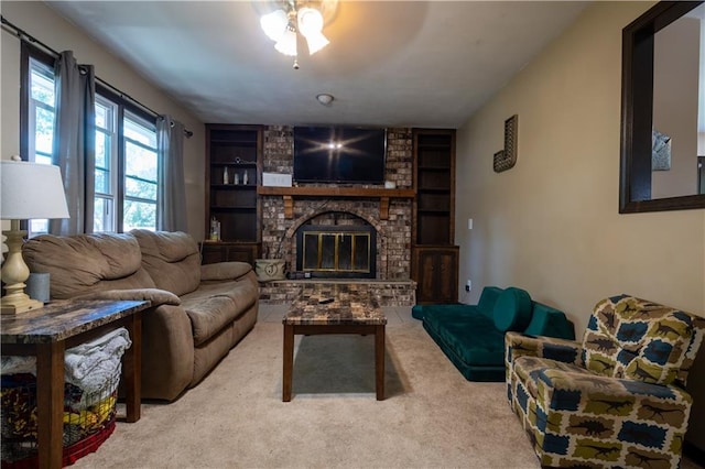 2905 Ajax Rd, Saint Joseph, MO 64503 - living area with ceiling fan, built in features, a brick fireplace, and carpet