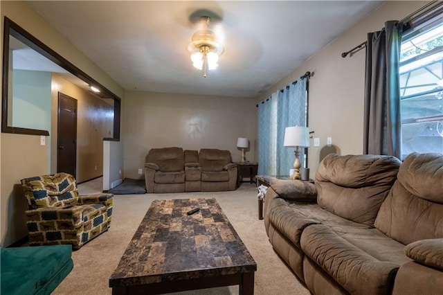 2905 Ajax Rd, Saint Joseph, MO 64503 - carpeted living area featuring ceiling fan