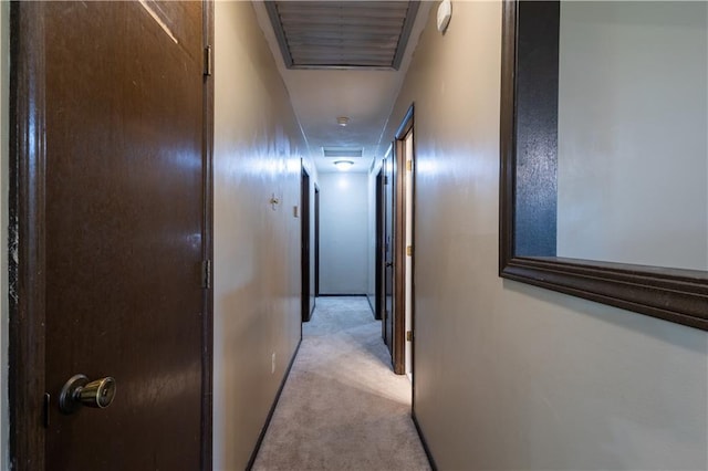 2905 Ajax Rd, Saint Joseph, MO 64503 - corridor with light carpet and baseboards