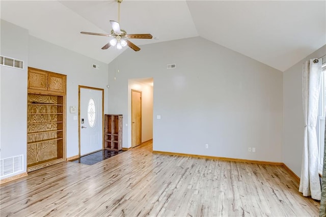 506 12th Ter, Tonganoxie, KS 66086 - entryway featuring light wood-type flooring, ceiling fan, and high vaulted ceiling