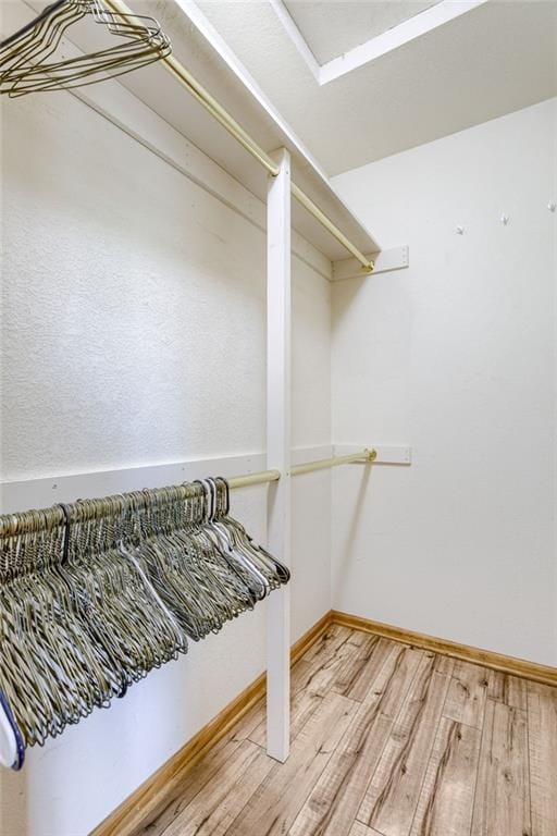 506 12th Ter, Tonganoxie, KS 66086 - spacious closet with light wood-style floors