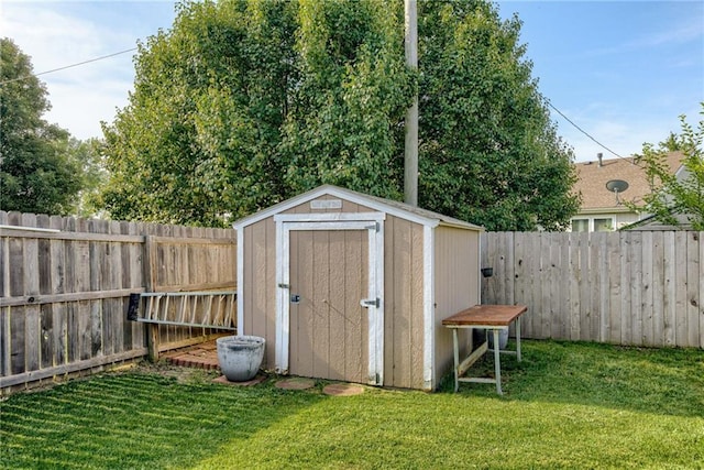506 12th Ter, Tonganoxie, KS 66086 - view of shed with a fenced backyard
