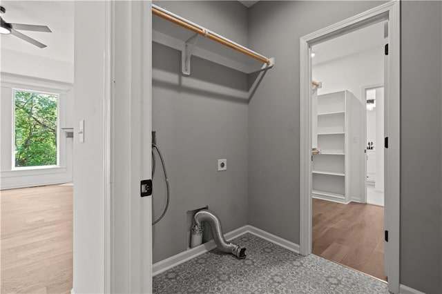 20015 W 221st St, Spring Hill, KS 66083 - laundry room with hookup for an electric dryer, ceiling fan, and wood finished floors