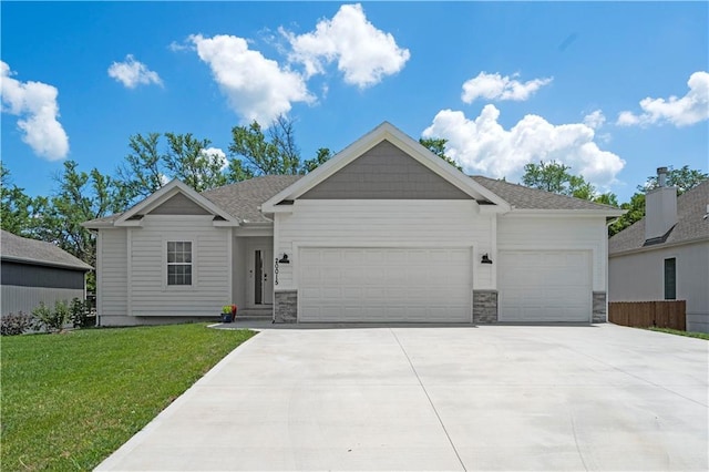 20015 W 221st St, Spring Hill, KS 66083 - view of front of property featuring a garage, driveway, and stone siding