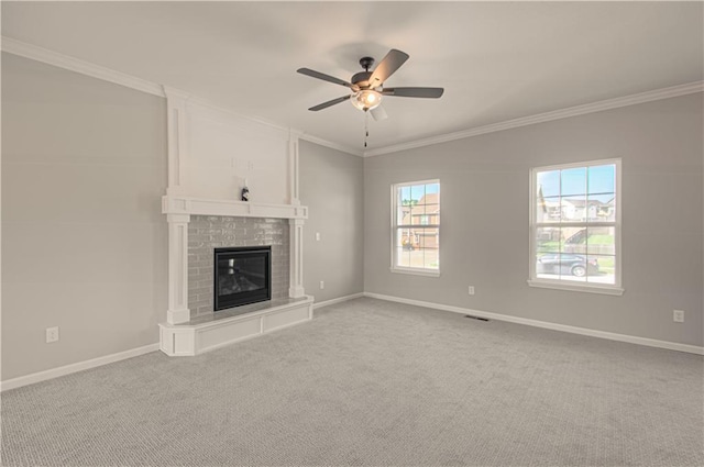 6110 NE 118th St, Kansas City, MO 64156 - unfurnished living room featuring a ceiling fan, crown molding, a fireplace, and carpet