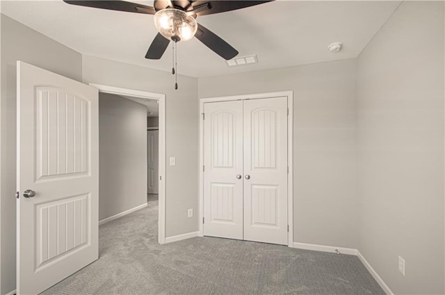 6110 NE 118th St, Kansas City, MO 64156 - unfurnished bedroom featuring carpet flooring, a closet, and ceiling fan