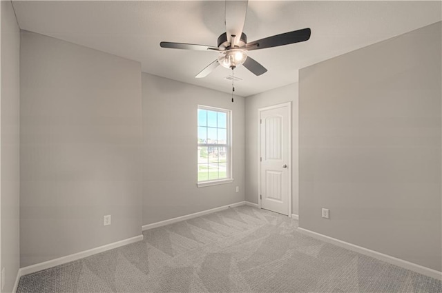 6110 NE 118th St, Kansas City, MO 64156 - unfurnished room with light colored carpet and ceiling fan
