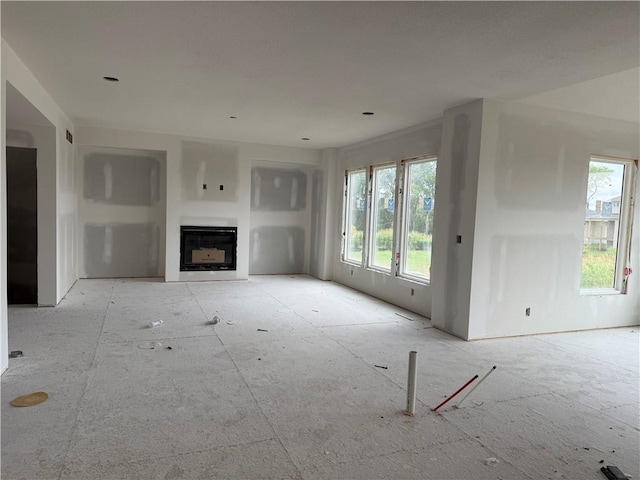 18505 Mohawk Ln, Overland Park, KS 66085 - unfurnished living room featuring a fireplace