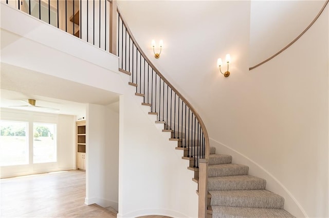 18505 Mohawk Ln, Overland Park, KS 66085 - staircase with baseboards and wood finished floors
